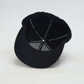 Close-up of the JOINTS Black Logo Performance Hat