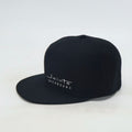 Side view of JOINTS Black Logo Performance Hat